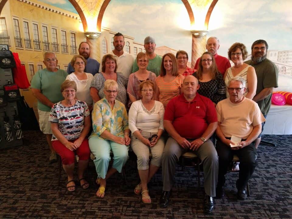 Group photo of friends and family gathered together.