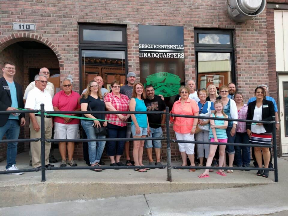 Group photo outside Sesquicentennial Headquarters building